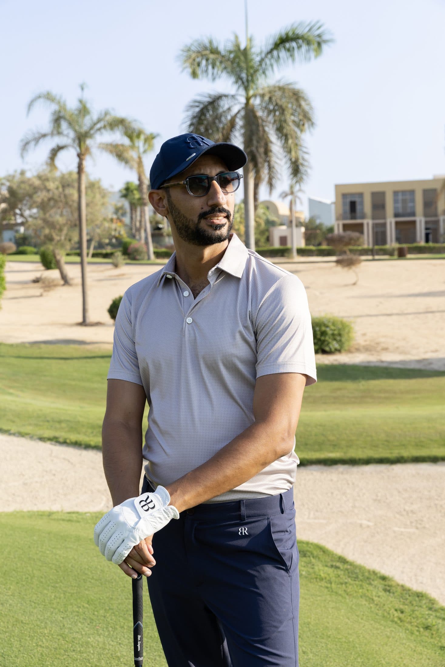 Ahmed Gheith on the course, club in hand
